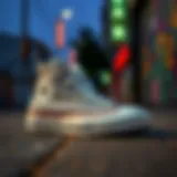 Classic Chuck Taylor All Star sneakers on a vibrant urban background
