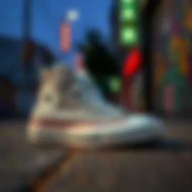 Classic Chuck Taylor All Star sneakers on a vibrant urban background