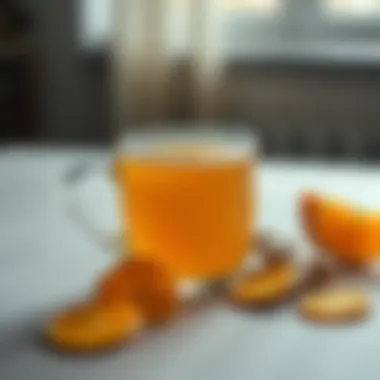 Ginger Tea and Its Health Benefits A bright cup of ginger tea with slices of ginger beside it