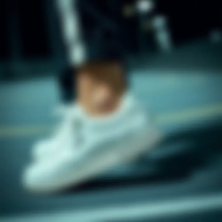 Fashionable outfit featuring Hummel white sports shoes