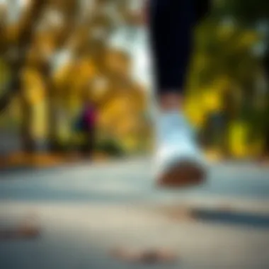 A person running in Hummel white sports shoes in a park